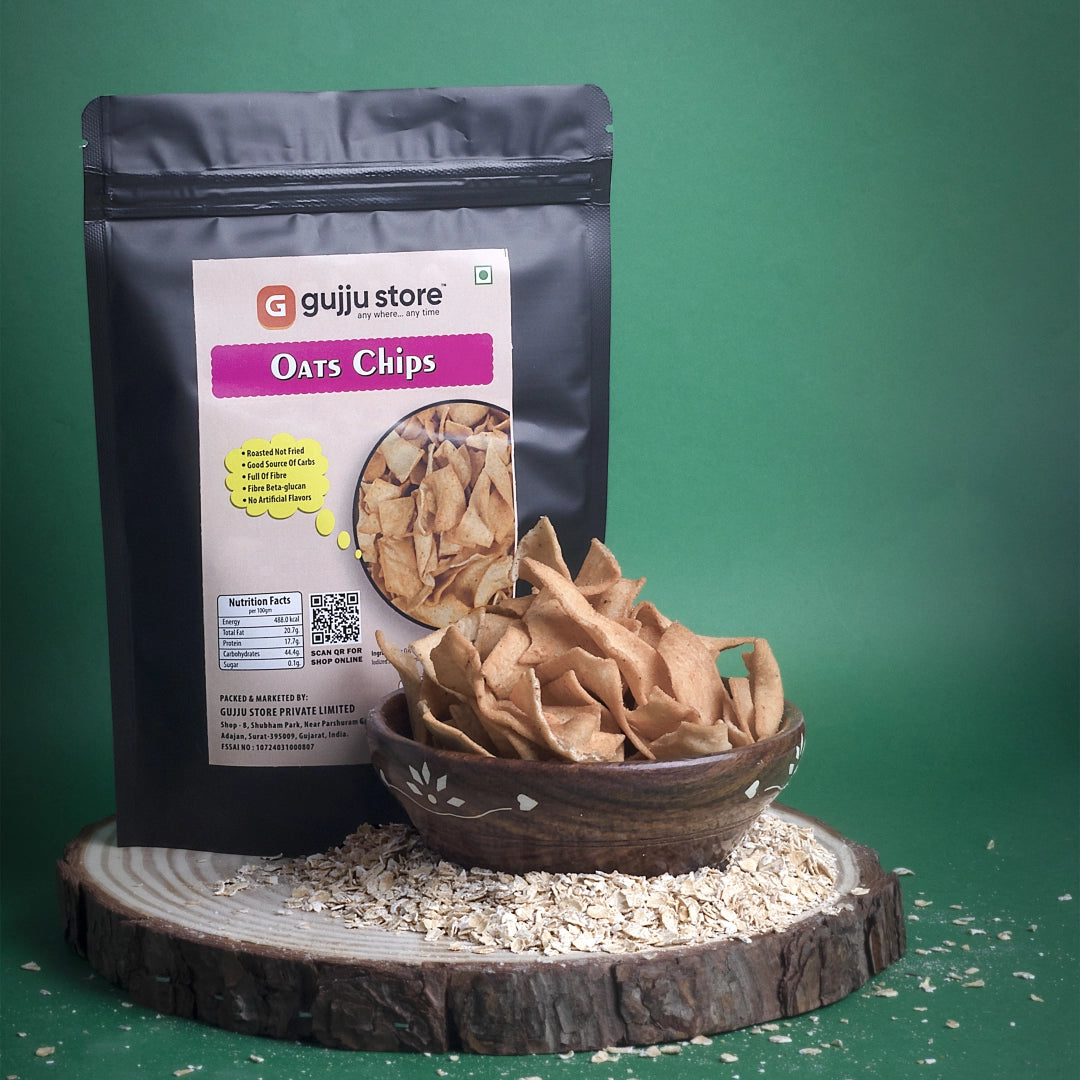 A crispy, golden-brown bowl of Oats Chips, made from oat millets, urad flour, and tapioca flour, lightly seasoned with Indian spices and iodized salt. Roasted, not fried, these chips are infused with cottonseed oil for flavoring, offering a wholesome and crunchy snacking experience.